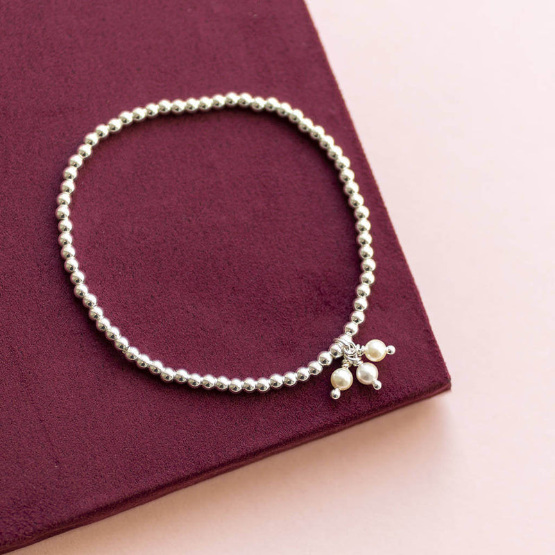 Image shows silver 30th birthday pearl charm beaded bracelet