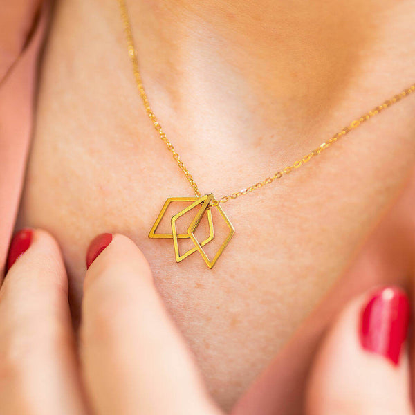 Image shows model wearing 30th birthday triple rhombus necklace