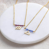 Image shows two Birthstone Bar Necklace with Zodiac Charm Detail
