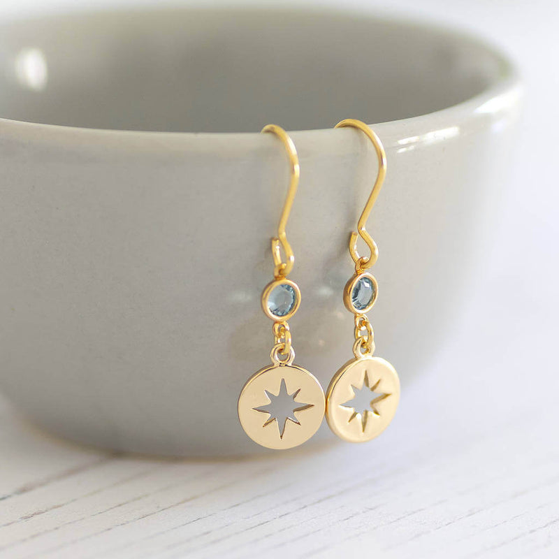 Image shows Gold Starburst Birthstone Earrings with March birthstones