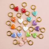Images shows colourful Mix and Match Glazed Heart Huggie Hoop Earrings