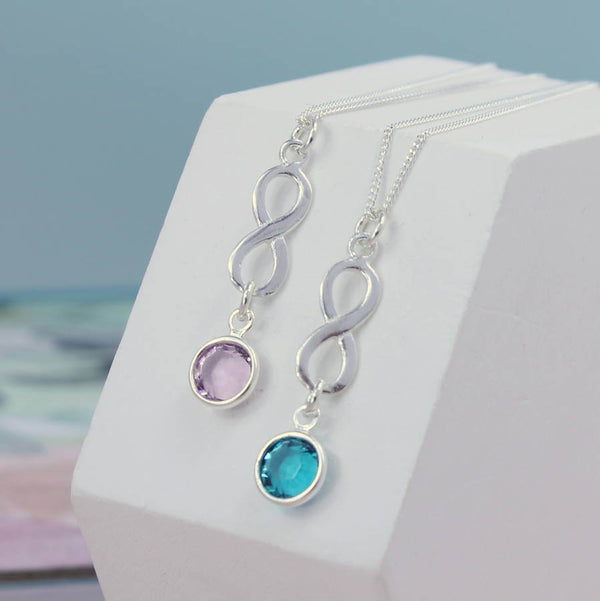Image shows 2 Sterling Silver Infinity Birthstone Pendants