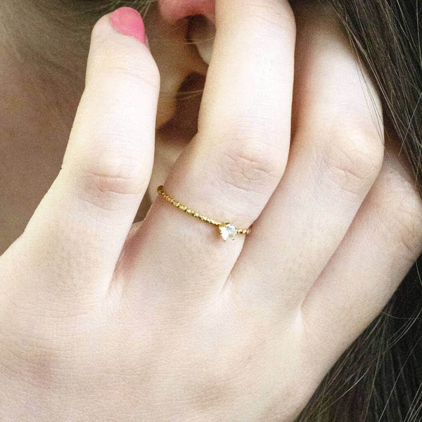 Model wears Solitaire Crystal Stacking Ring.