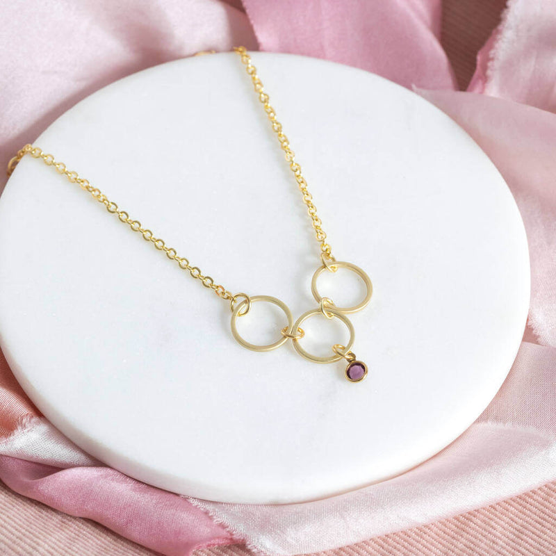 Image shows 30th birthday circles birthstone necklace with amethyst birthstone
