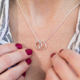 Image shows model wearing 30th birthday triple circle necklace