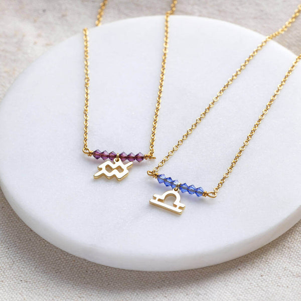 Image shows two Birthstone Bar Necklace with Zodiac Charm Detail