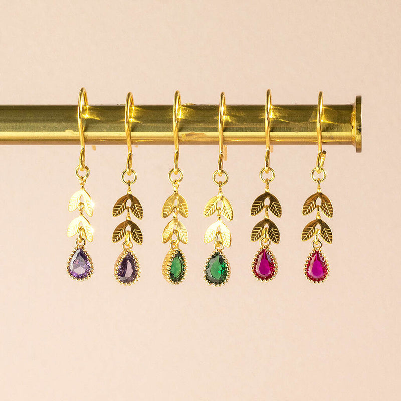 Image shows a selection of Birthstone Teardrop Earrings With Leaf Detail