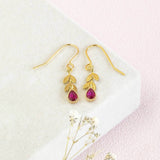 image shows Birthstone Teardrop Earrings With Leaf Detail with July birthstone