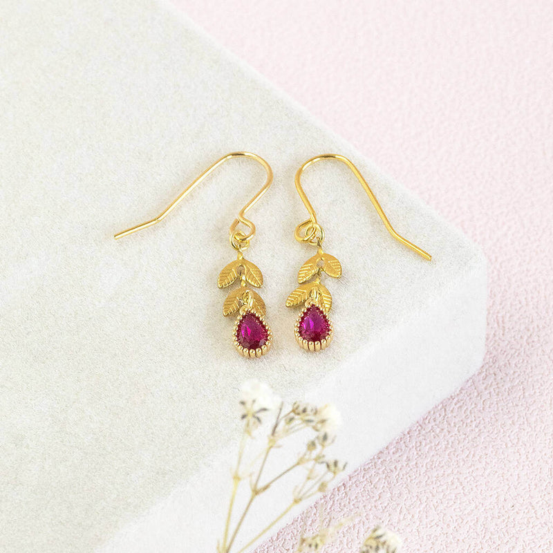 image shows Birthstone Teardrop Earrings With Leaf Detail with July birthstone