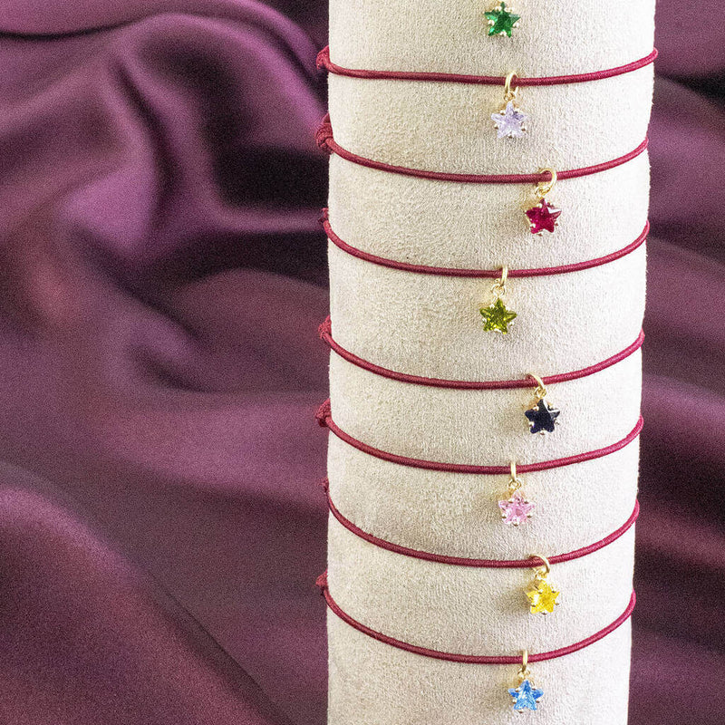 Image shows Birthstone Star Friendship Bracelet in all 12 birthstone colours