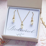 Bridesmaid pearl and star jewellery set in a gift box on a bridesmaid sentiment card