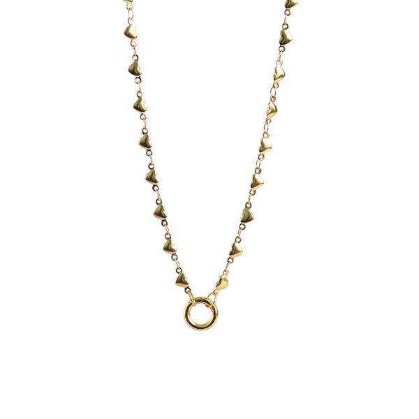 image shows a gold plated charm keeper necklace with heart detail