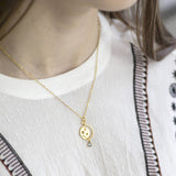 Image shows model wearing gold Celestial Birthstone Necklace