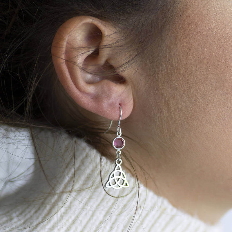 Image shows model wearing Celtic Knot Birthstone Earrings