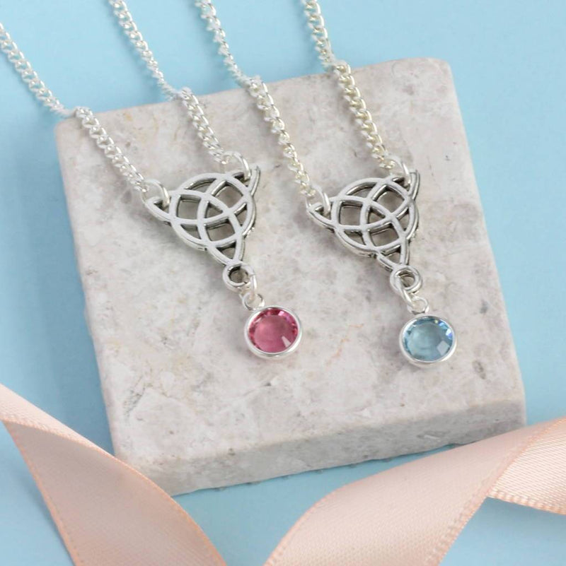 Image shows two Celtic knot birthstone necklaces