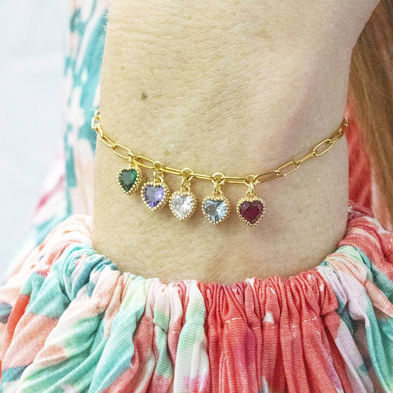 Image shows model wearing Charm Bracelet with Family Birthstone Hearts