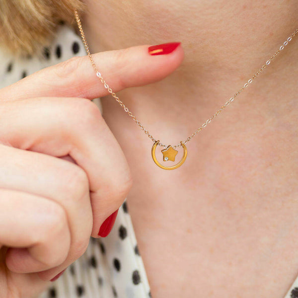 Image shows model wearing Contemporary Moon And Star Floating Necklace