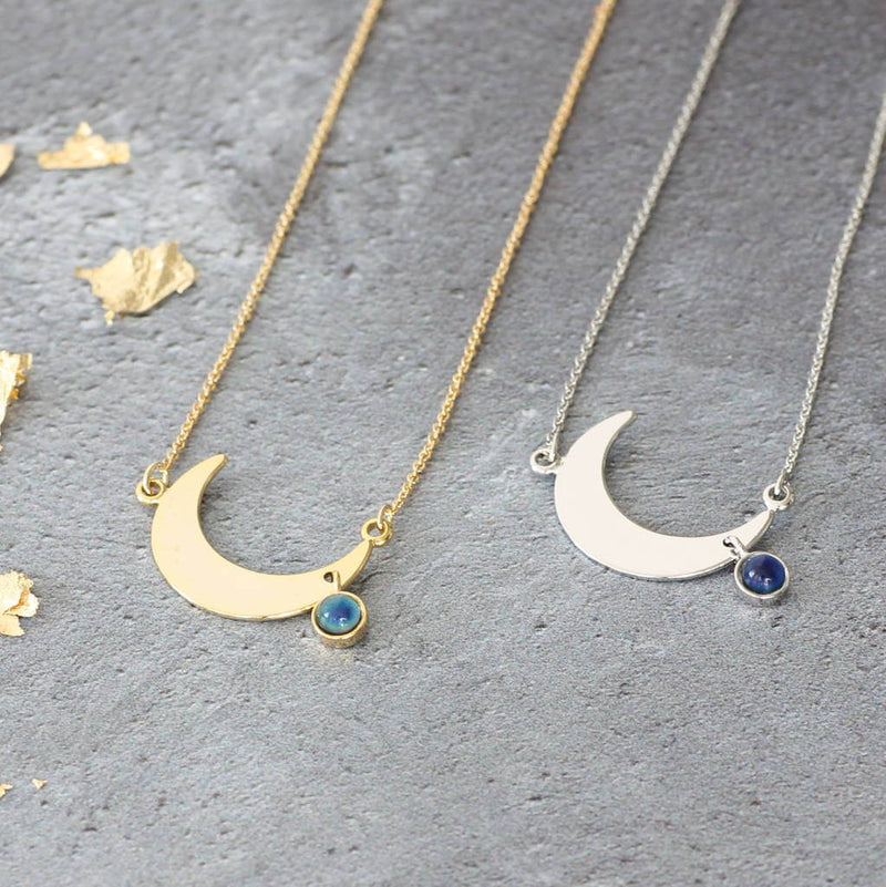 Image shows a gold and silver Image shows model wearing Crescent Moon Necklace With Mood Stone  