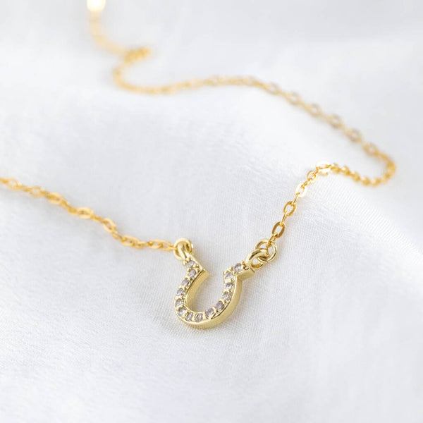 Image shows gold Crystal Pave Lucky Horseshoe Necklace