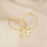 Image shows Dainty Initial Charm Hoop Earrings with initials S and F