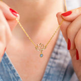 Image shows model wearing Dainty Lotus Necklace with Birthstone Detail