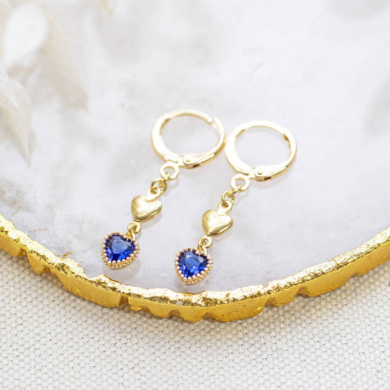 Image shows Double Heart Sapphire Birthstone Earrings
