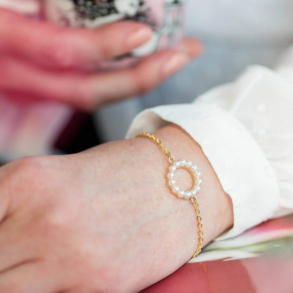 Model wears eternity pearl bracelet