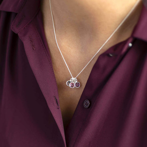 Image shows model wearing Family Birthstone Charm Pendant Necklace