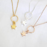 Image shows gold, silver and rose gold floating circle necklaces with personalised star charm