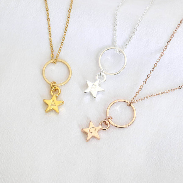 Image shows gold, silver and rose gold floating circle necklaces with personalised star charm