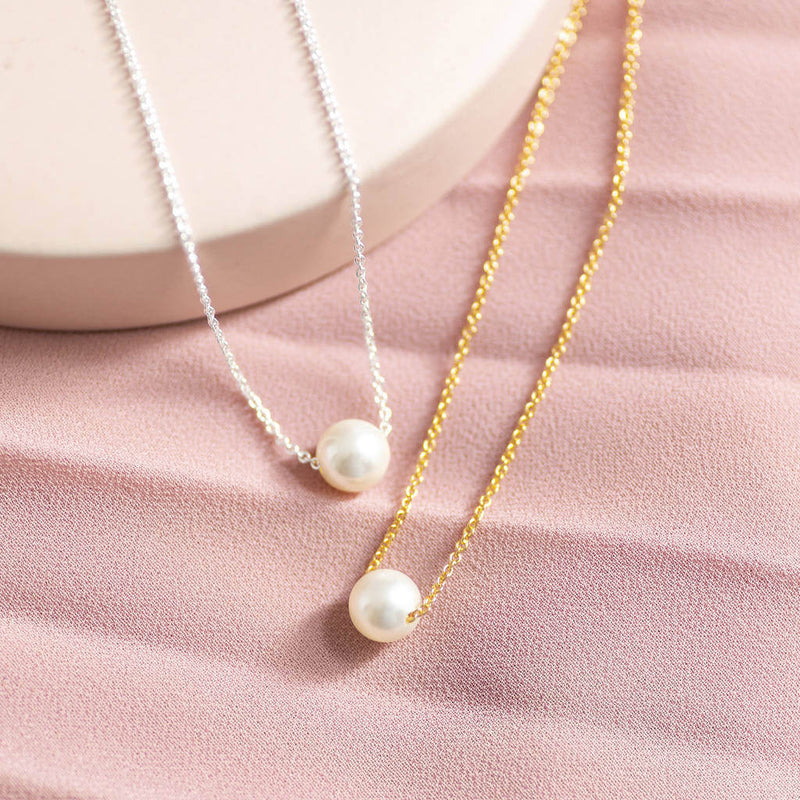 silver and gold floating pearl necklace with ivory pearl sidebar side