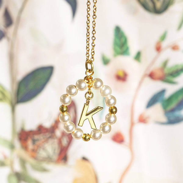 Image shows Framed Pearl Initial Charm Necklace with the initial K