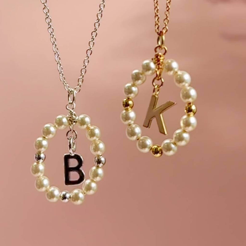 Image shows a Silver and gold Framed Pearl Initial Charm Necklace