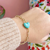 Image shows model wearing Glazed Heart Chunky Chain Bracelet