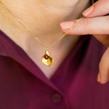 Image shows model wearing Gold Calla Lily Birthstone Necklace