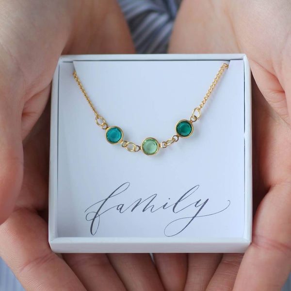 Image shows family birthstone link necklace in gift box on  family sentiment card