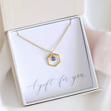 Image shows Gold Hexagon Birthstone Charm Necklace with September birthstone in a gift box on a gift for you sentiment card