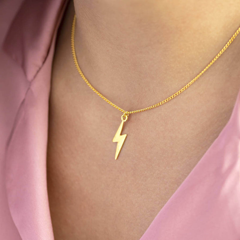 Image shows model wearing Gold Lightning Bolt Necklace