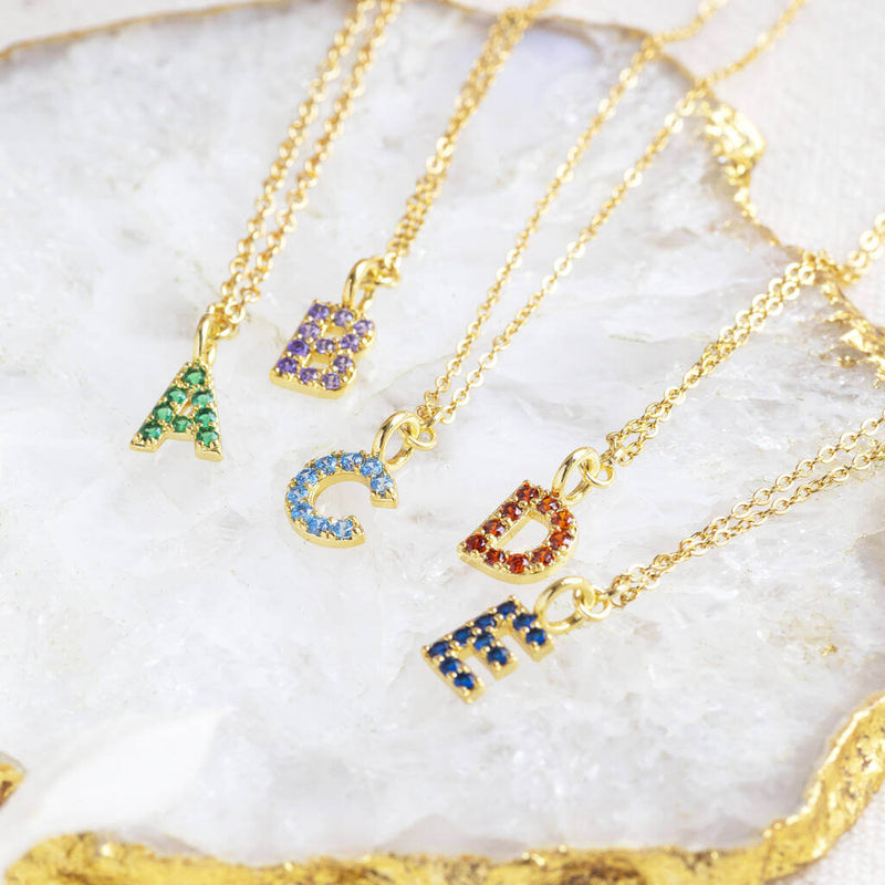 Images shows gold A May, B February, C March,D July and E Sapphire initials