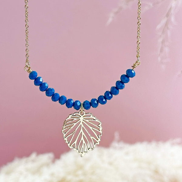 Image shows Gold Plated Leaf Necklace with Indigo Bead Detail