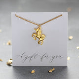 Image shows Gold Plated Unicorn Necklace on a gift for you sentiment card
