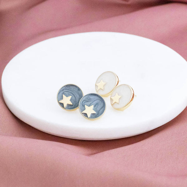 Image shows gold star circle stud earrings in ivory and grey