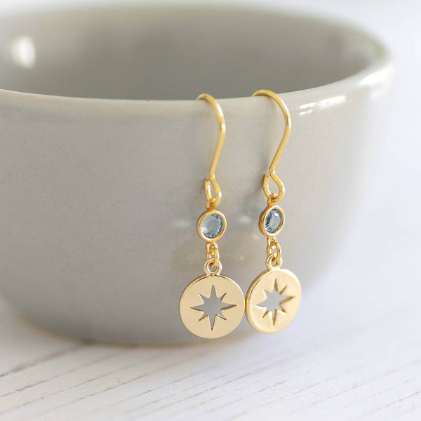 Image shows Gold Starburst Birthstone Earrings with March birthstones