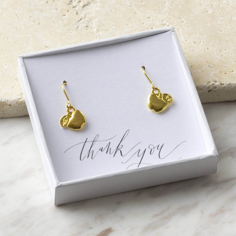 Image shows Golden Apple Earrings Thank You Teacher Gift in a gift boson Thank you sentiment card