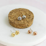 Image shows gold, silver and rose gold Love Knot Stud Earrings
