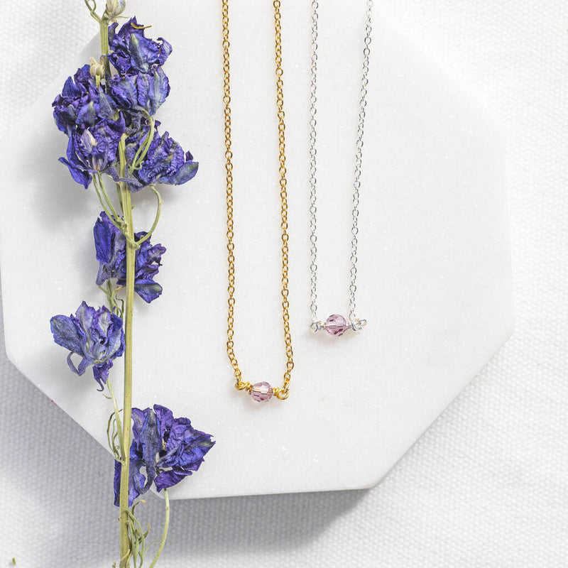 Image shows gold and silver Minimalist June Birthstone Single Bead Necklace