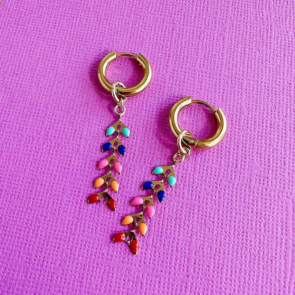 image shows multi coloured spiky chin earrings