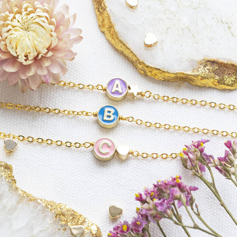 Image shows three Personalised Enamel Disc Initial Bracelet with the initial A,Band C