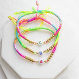Image shows three Personalised Neon Friendship Bracelets with the initial A B and C