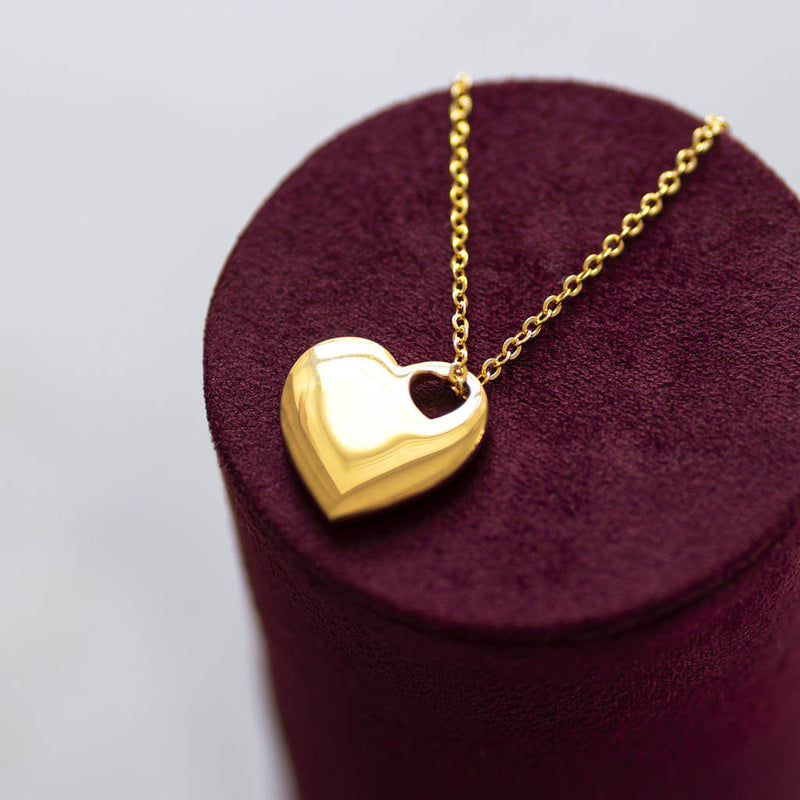 Image shows mage shows model wearing Polished Gold Cut Out Heart Necklace